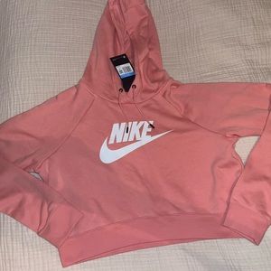 Never worn!!
Nike Crop Jacket - Peach/coral color 
Size M